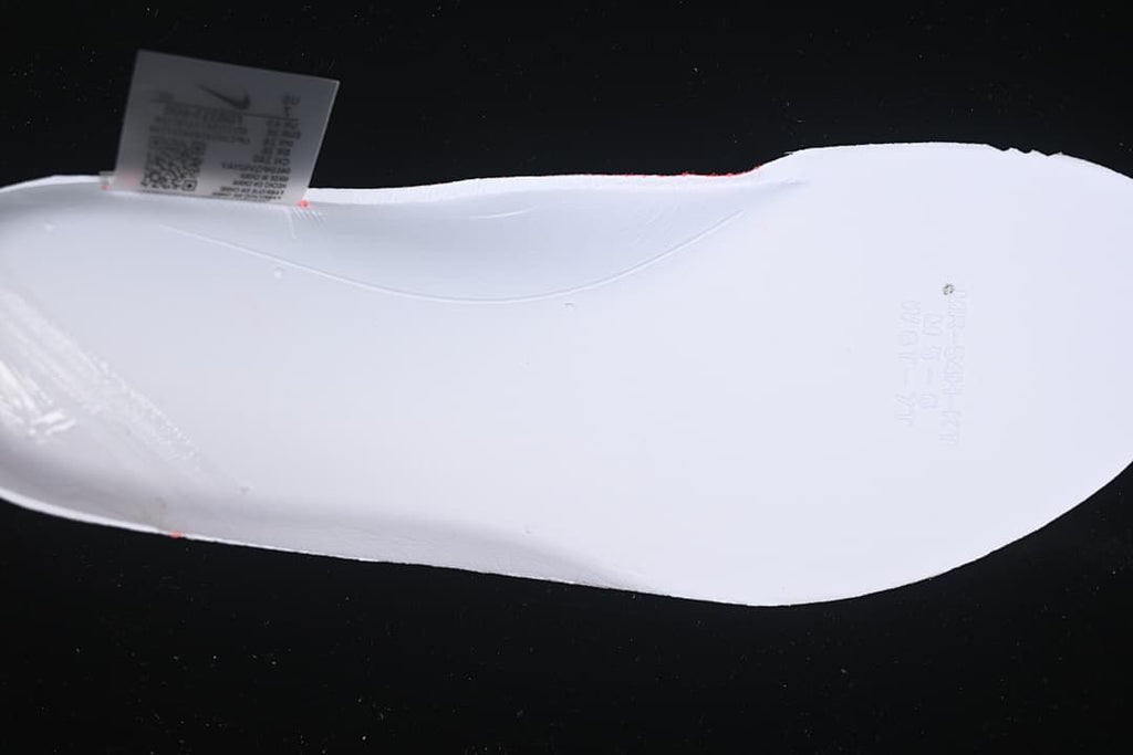 Close-up of the underside of a white shoe insert