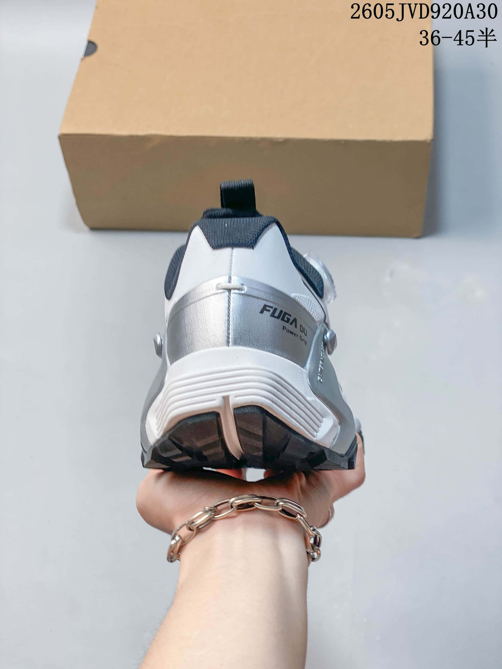Rear view showing the silver-toned heel detail and FUGA DU branding.