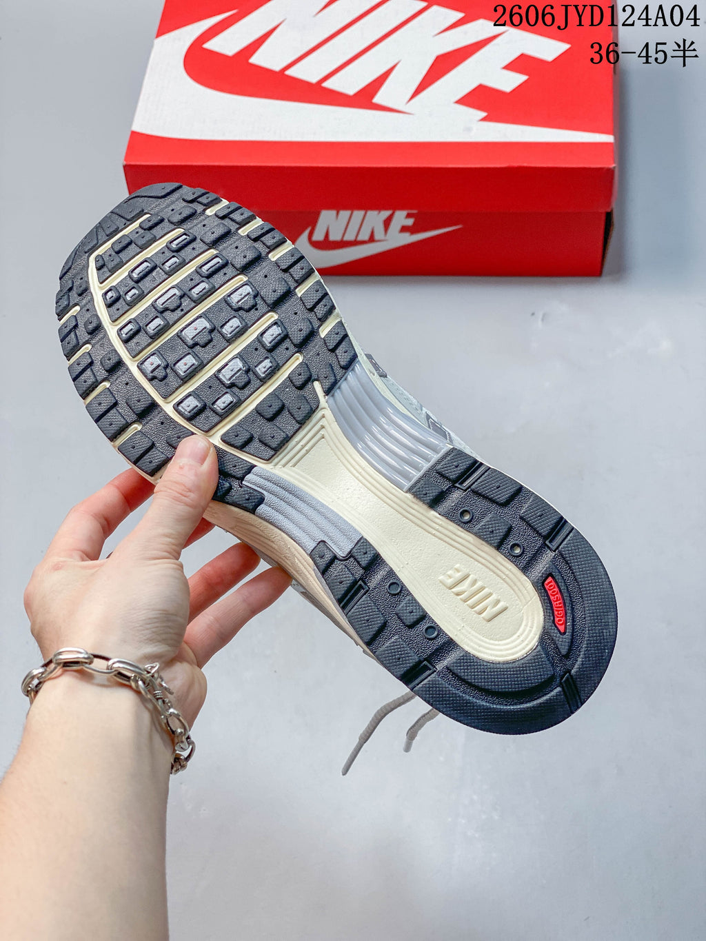 Close-up of the dark patterned outsole on a Nike P-6000 sneaker