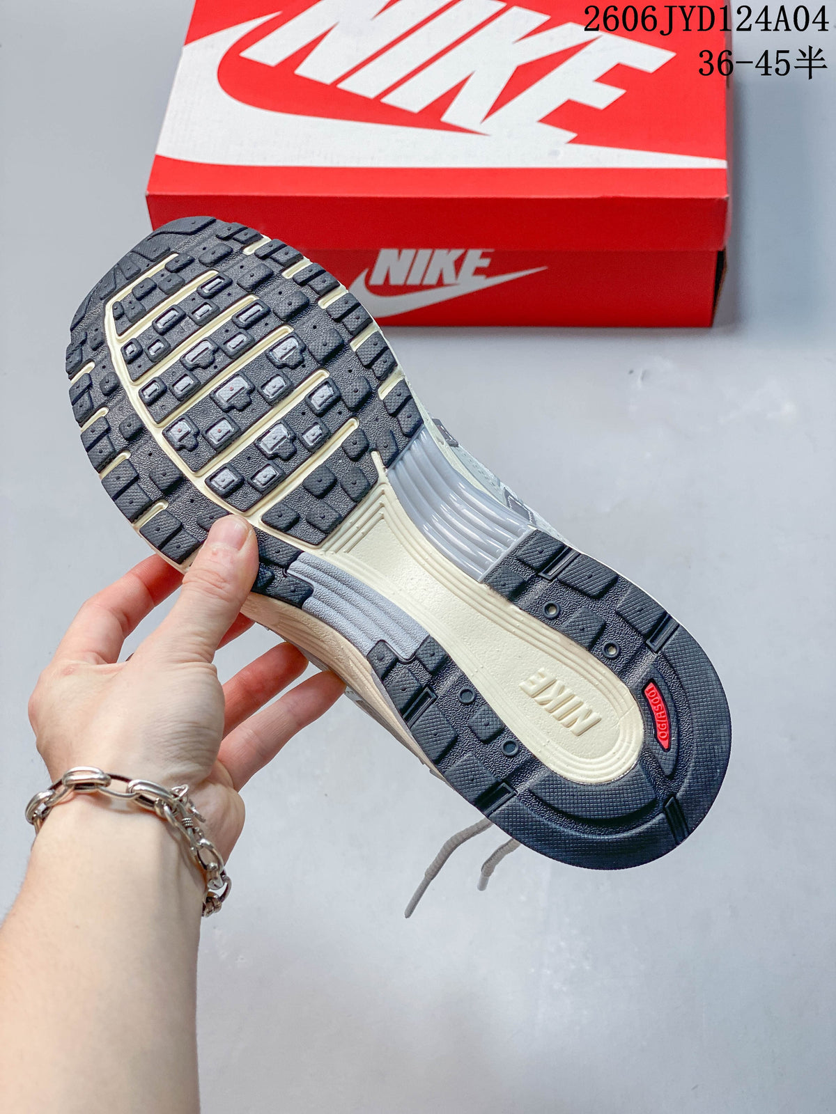 Close-up of the dark patterned outsole on a Nike P-6000 sneaker