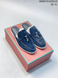 Pair of navy lock-detail mule loafers on a pink box; photo overlay shows style code 2606GYD1820A10 and sizes 36–41.
