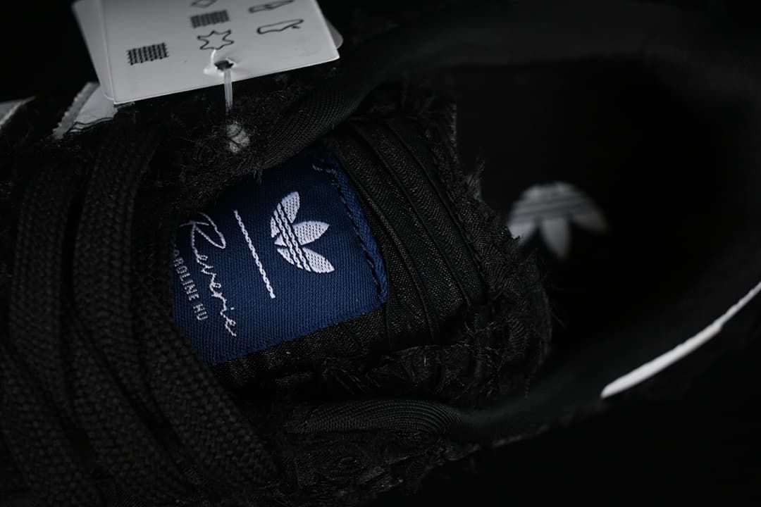 Close-up of the tongue label with adidas Trefoil and Wales Bonner markings