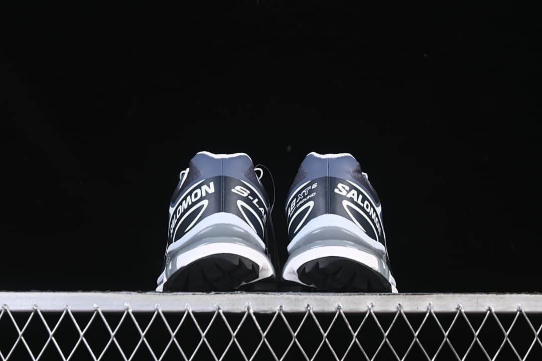 Rear view of both shoes showing the heel branding.