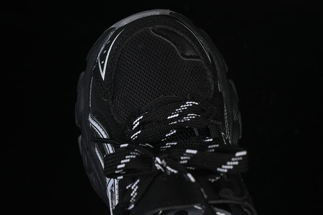Top view of the sneaker showing the mesh-like vamp and patterned laces.