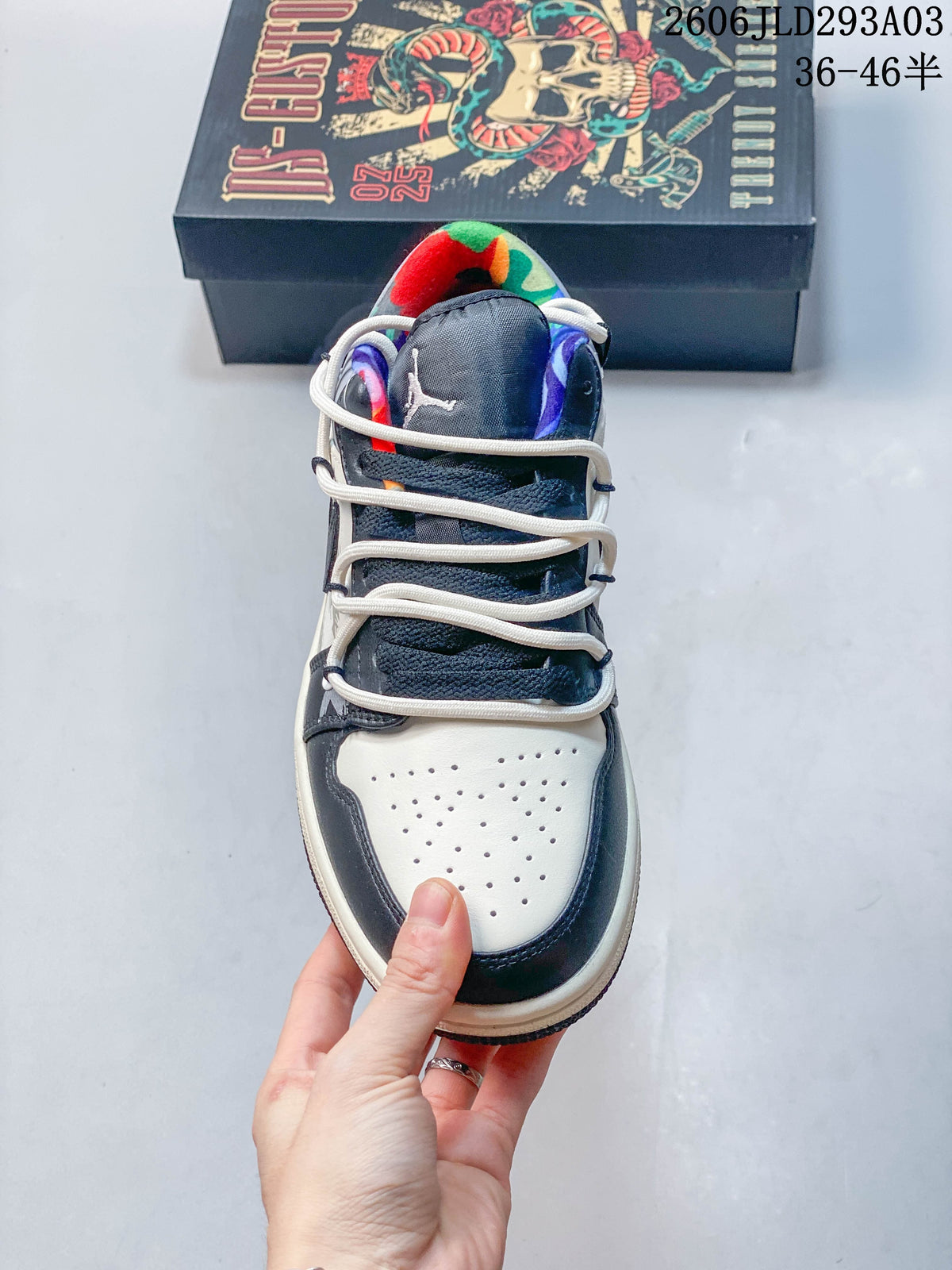Front view highlighting the perforated toe and colorful lining