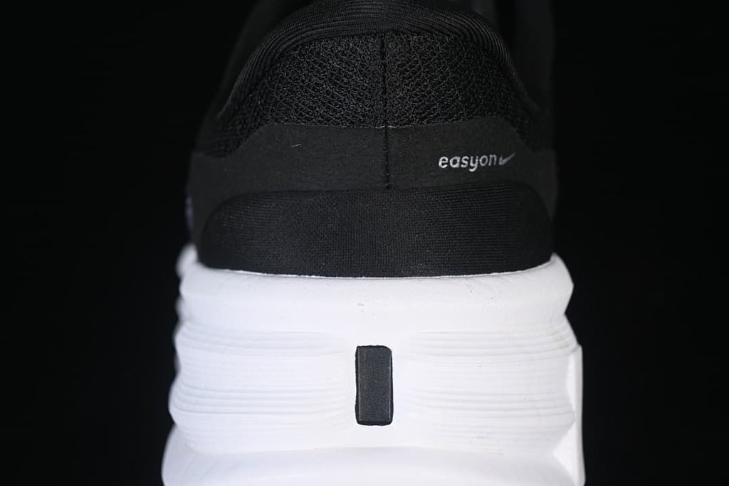 Rear view showing the Easyon branding and thick white heel midsole.