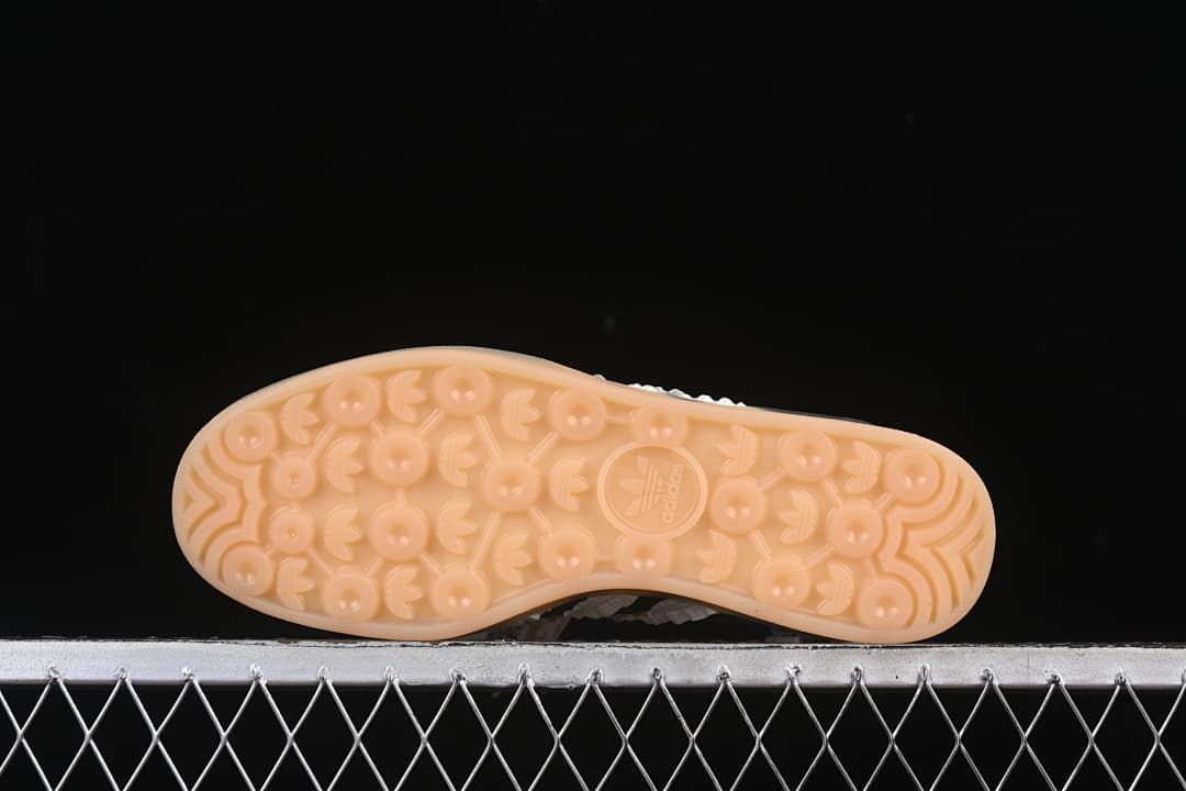 Underside view showing the gum-colored outsole tread pattern.