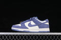 Side view of a blue and white Nike SB Dunk Low sneaker