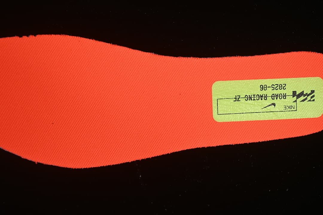 Close-up of coral insole with printed label