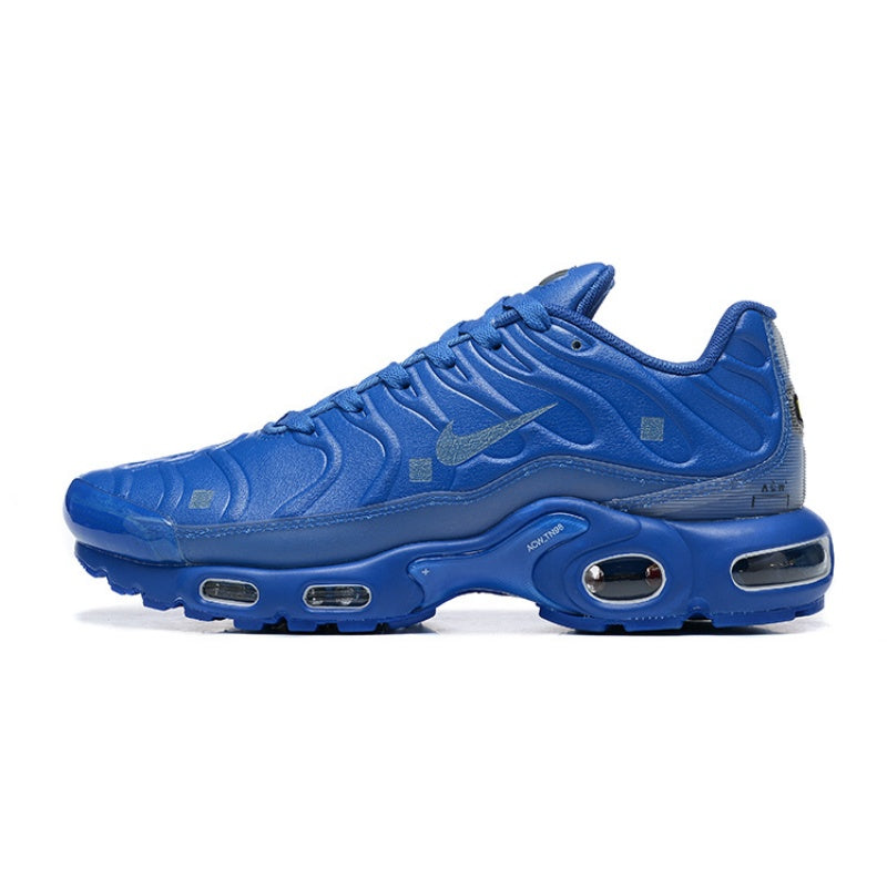 Side view of a blue Nike Air Max Plus-style sneaker.