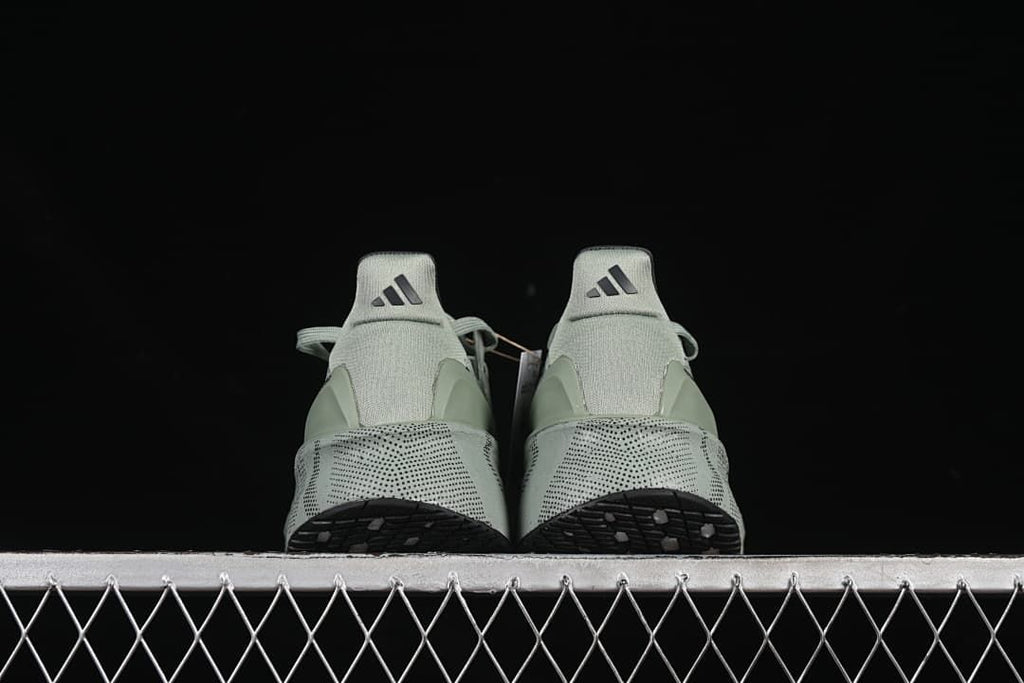 Rear view of the pair showing heel tabs and outsole edges