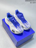 Gray-and-white adidas Hyperboost Edge M shoes with blue accents, shown on a blue box