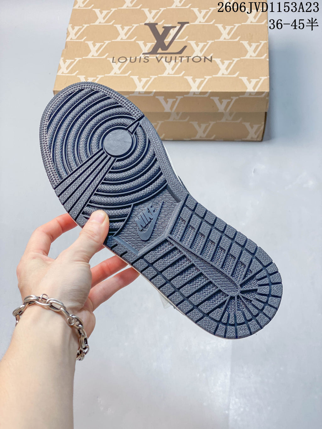 Close-up of the dark blue patterned outsole