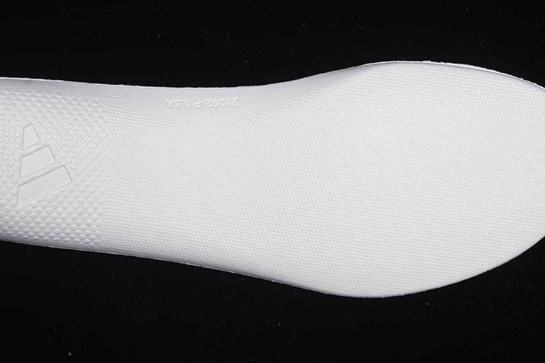 Close-up of the white textured midsole outsole surface