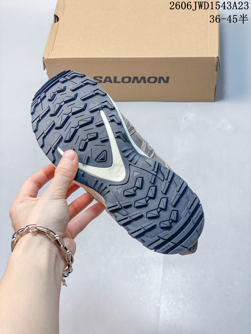 Close-up of the lugged outsole on a Salomon XA Pro 3D shoe