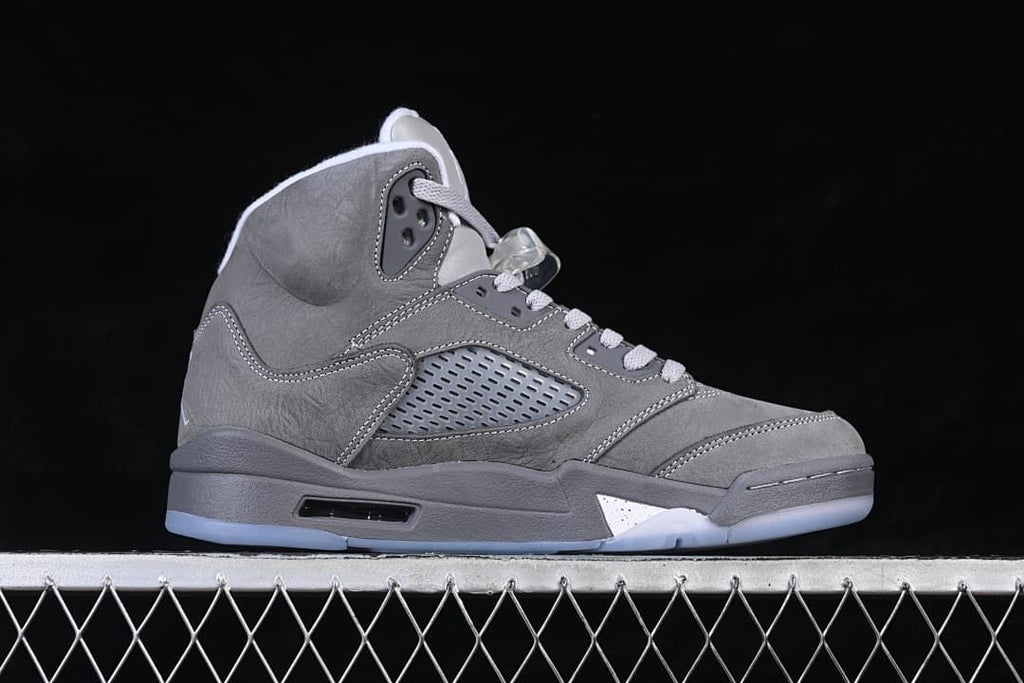 Side profile of the grey high-top sneaker