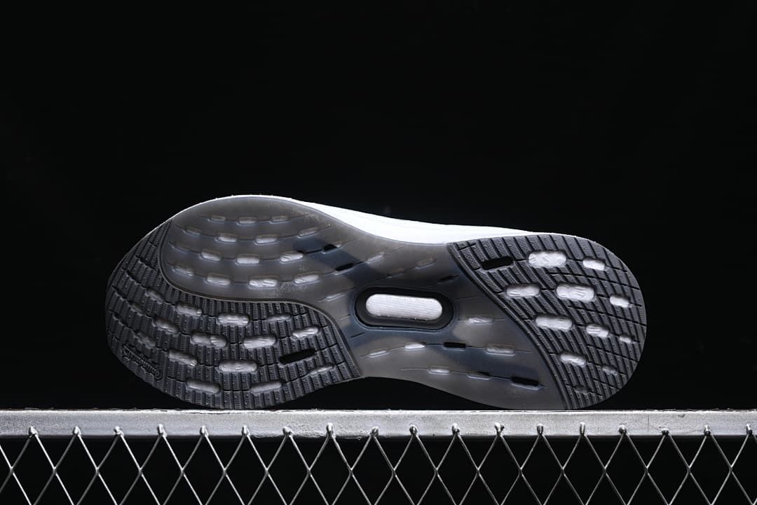 Underside view showing the patterned dark outsole