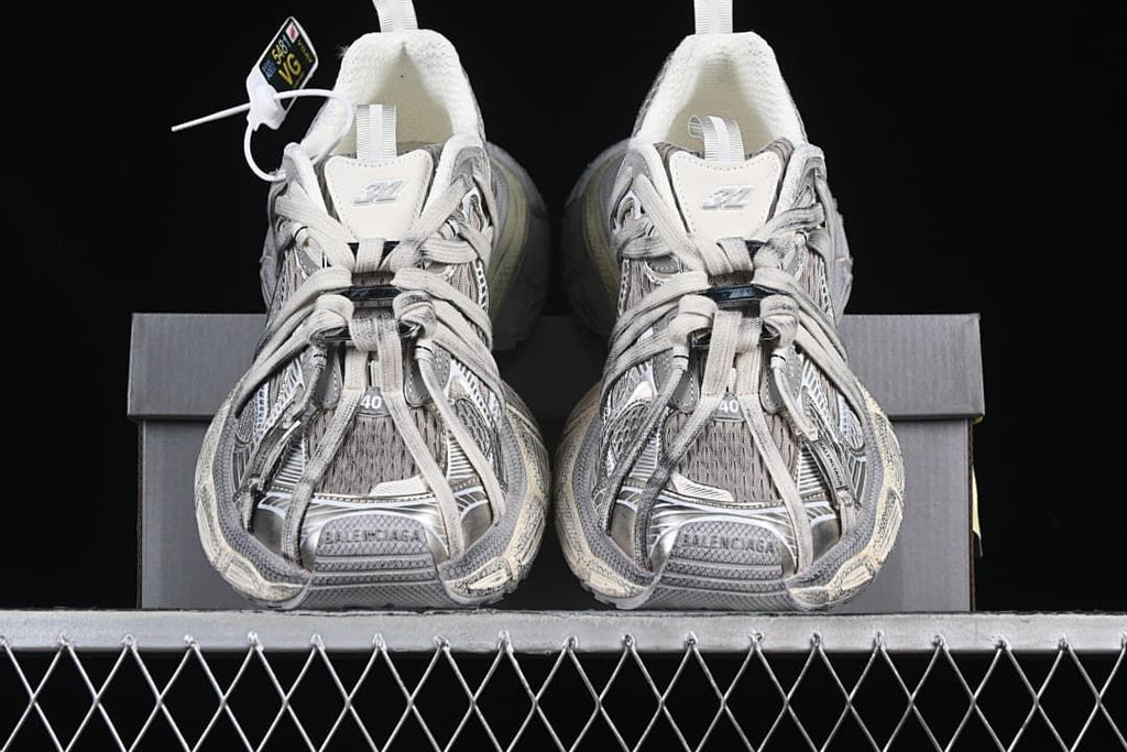 Front view of the pair showing the layered toe and lacing