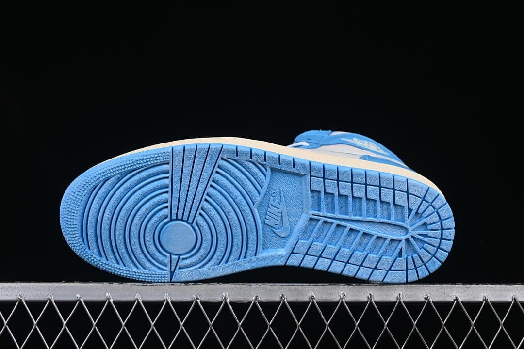 Underside view showing the blue outsole tread