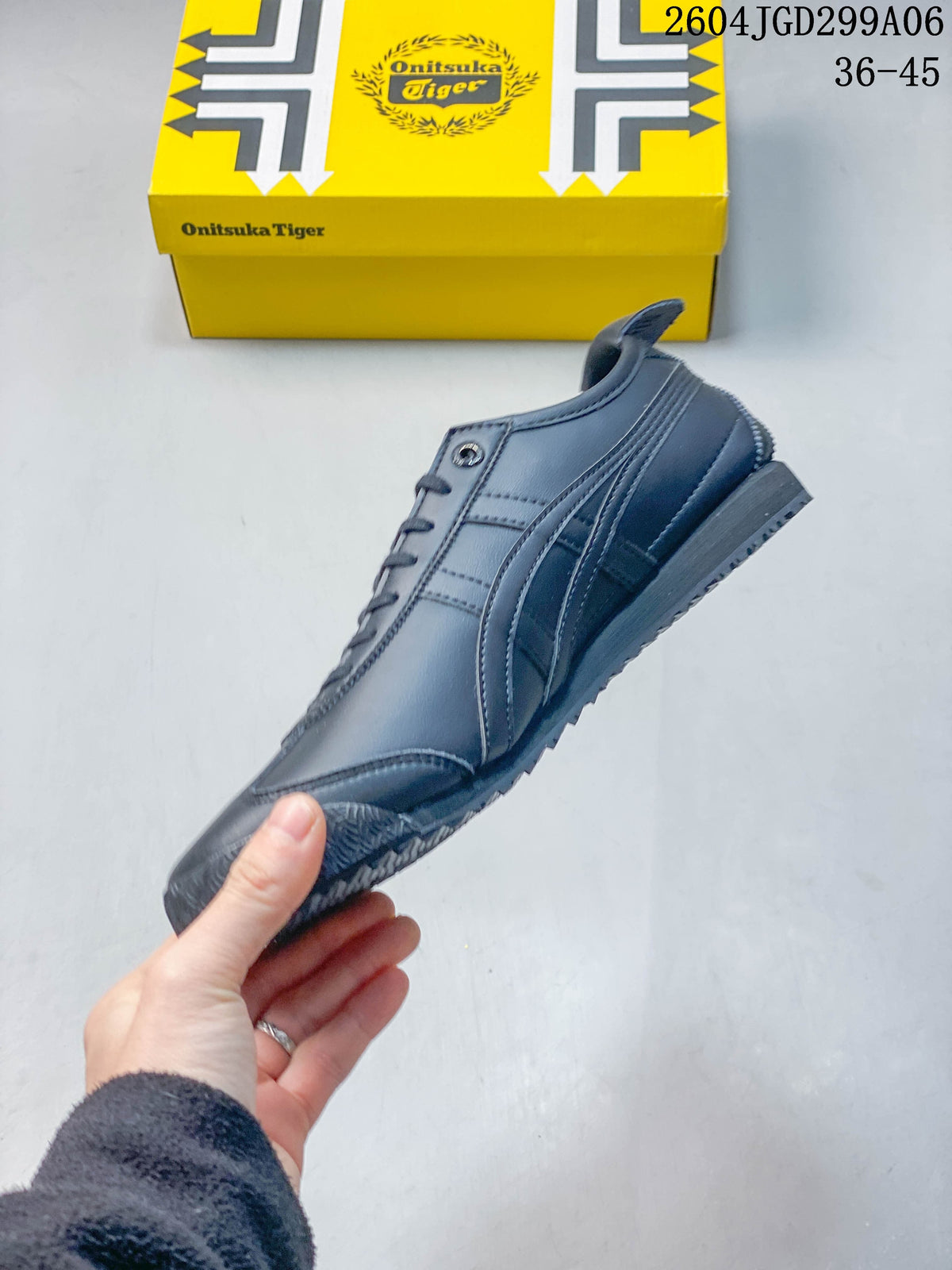 Side profile of a charcoal gray low-top sneaker with tiger-stripe detailing