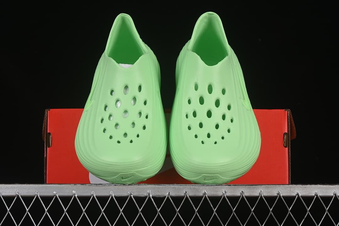 Pair of clogs viewed from the front, showing the perforated toes
