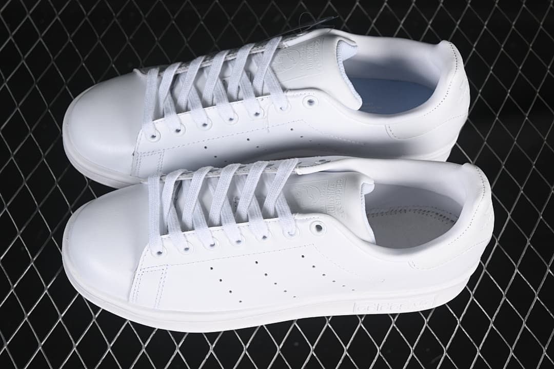 Pair of white Stan Smith sneakers shown from above at an angle