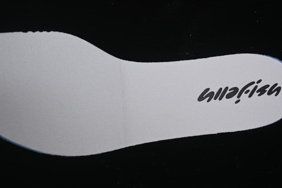 White shoe insole with printed branding
