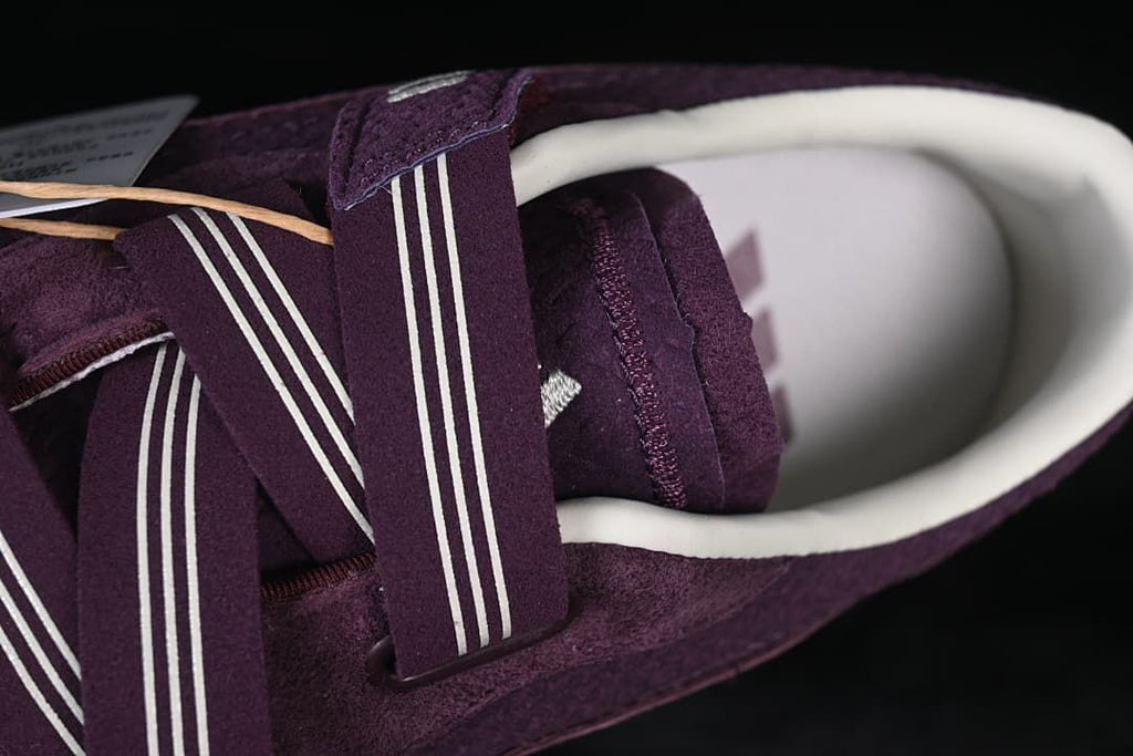 Close-up of the purple straps with white stripe details
