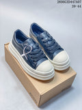 Navy and off-white ECCO lace-up sneakers shown together, with a chunky sole.