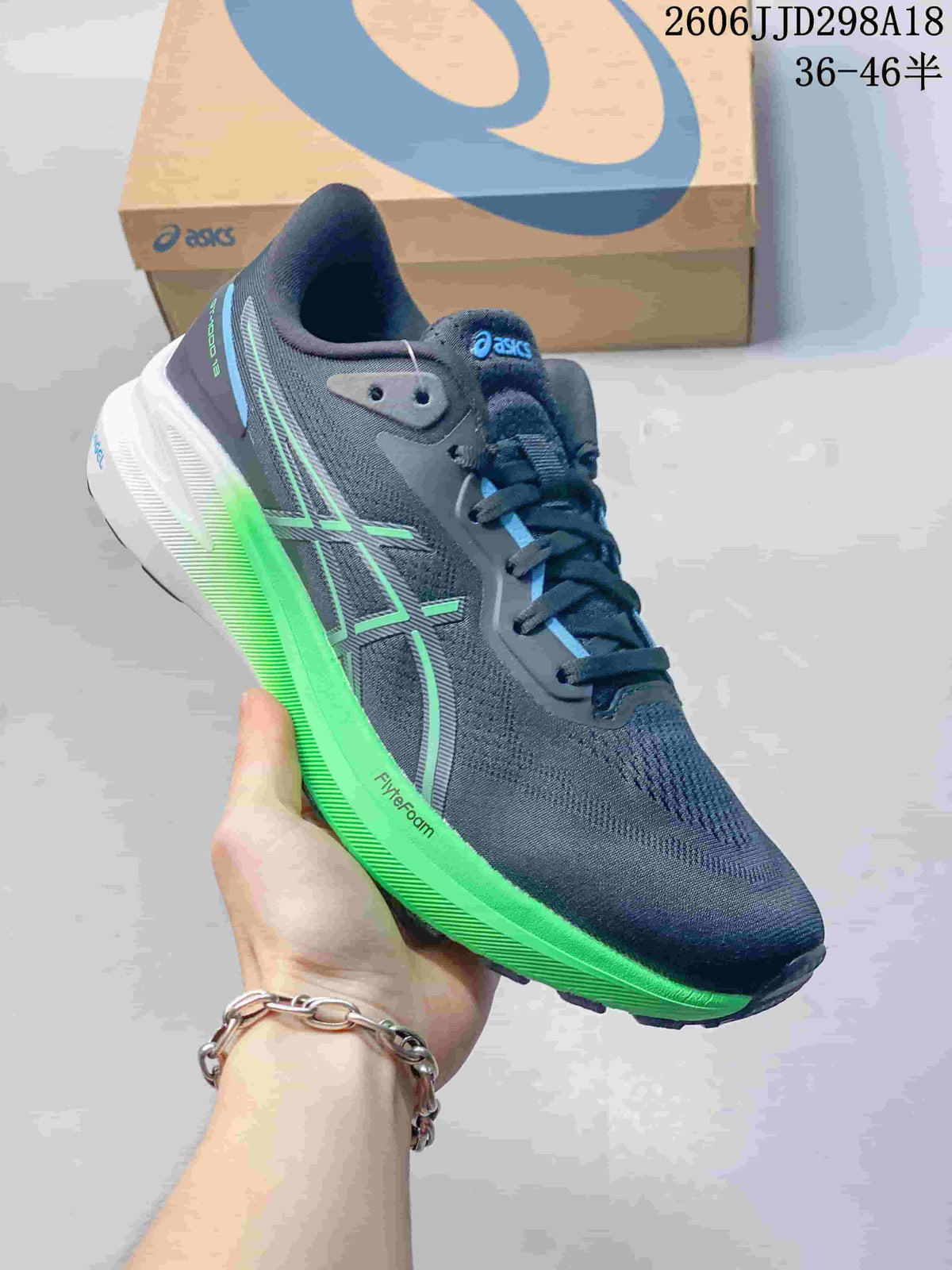 Angled side view of a navy ASICS GT-1000 13 running shoe with bright green accents.