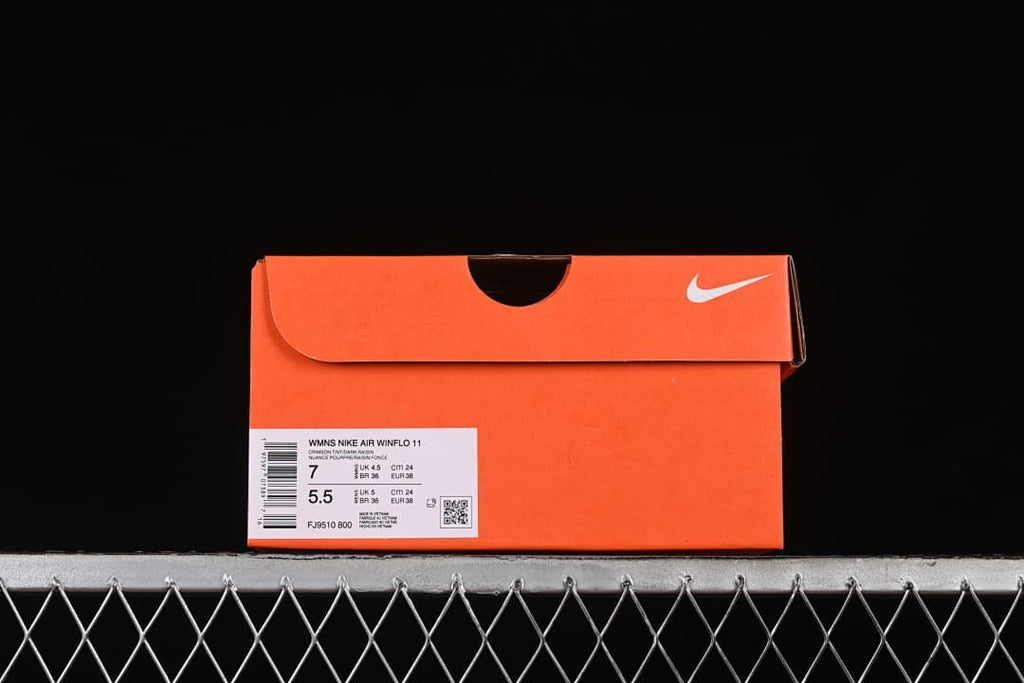 Orange shoe box label identifying the women's Nike Air Winflo 11, size US 7 and EUR 38, style FJ9510 800.
