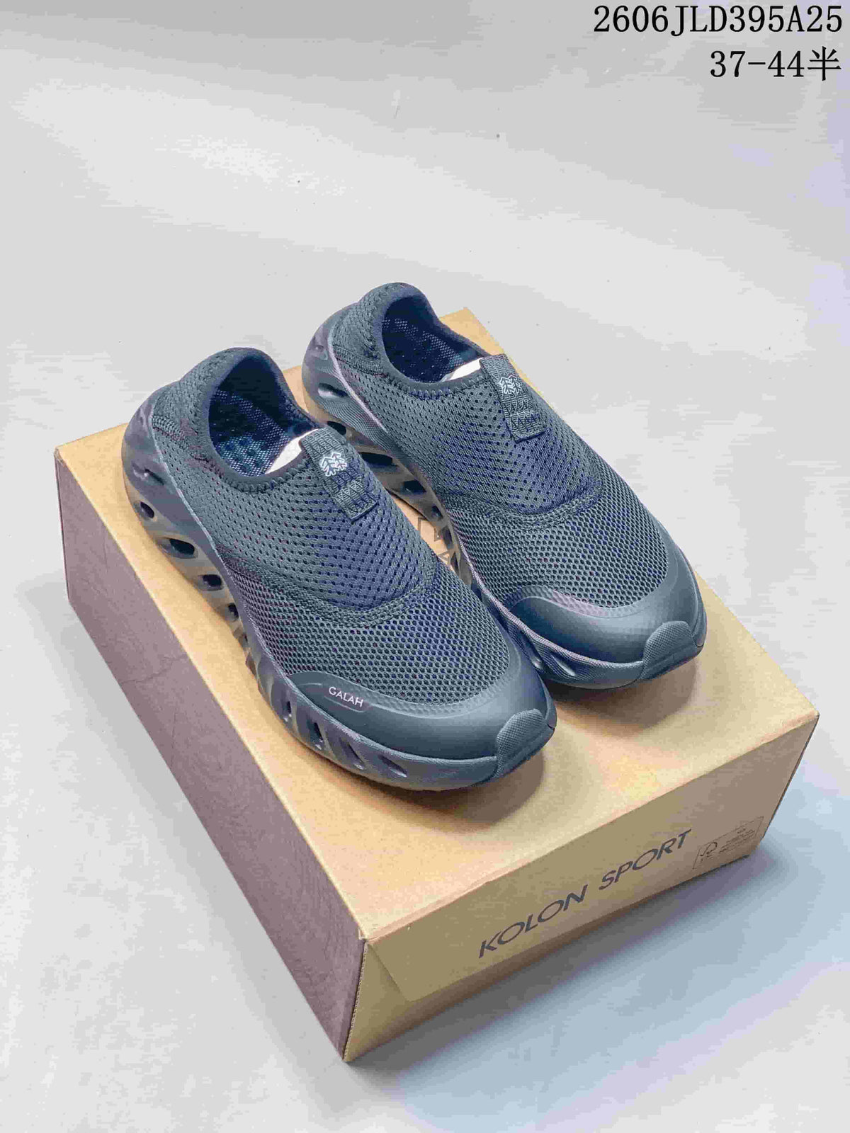 Dark gray KOLON SPORT Galah slip-on shoes with perforated-looking uppers, shown on a box; image overlay lists sizes 37–44.5.