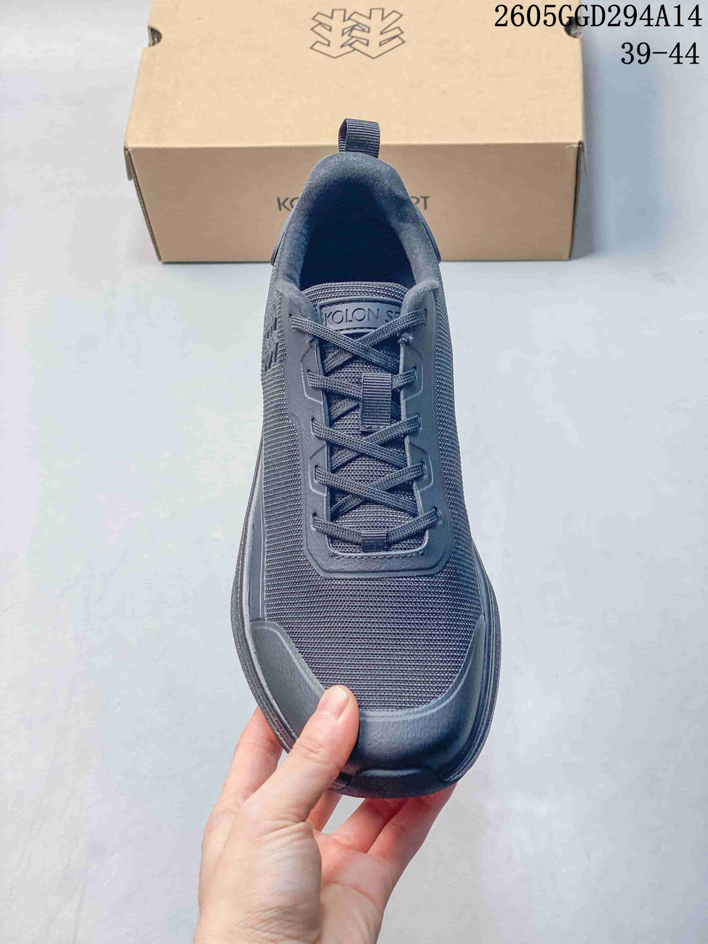 Top view showing the laces, tongue and textured panels