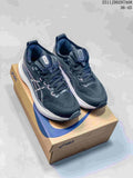 Navy and white ASICS GEL-KAYANO running shoes displayed on a branded box; image label shows 36–45 and code 2511JDD297A08.