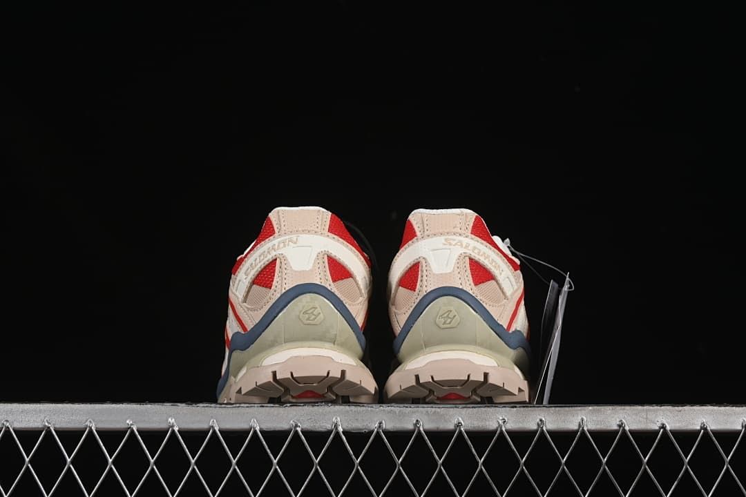 Rear view of the pair showing heels and patterned outsoles