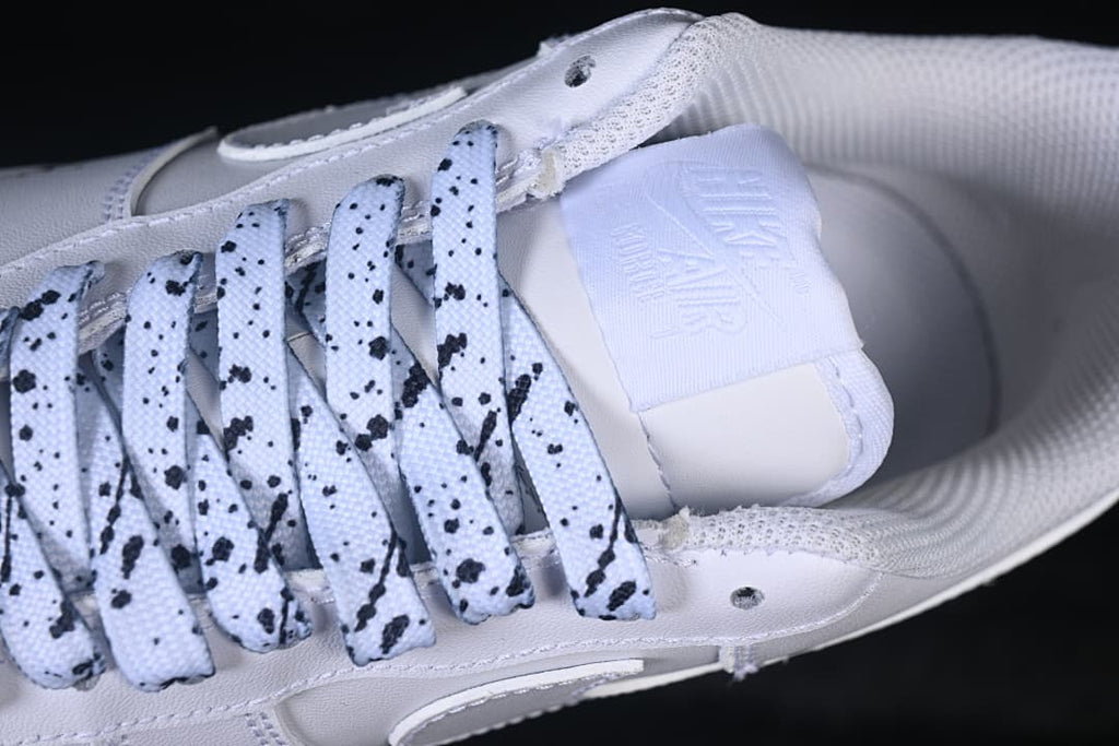 Close-up of the speckled laces and tongue label