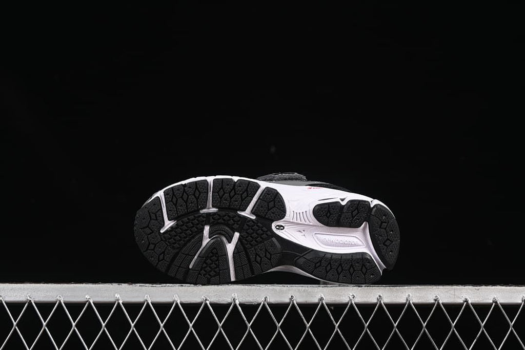 Underside view showing the black tread and white sections of the outsole.