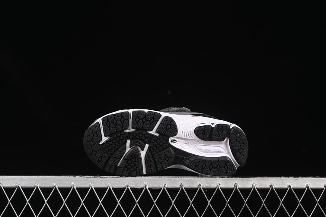 Underside view showing the black tread and white sections of the outsole.