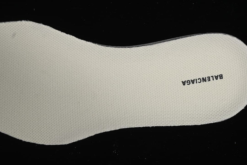 Close-up of the removable insole with printed branding