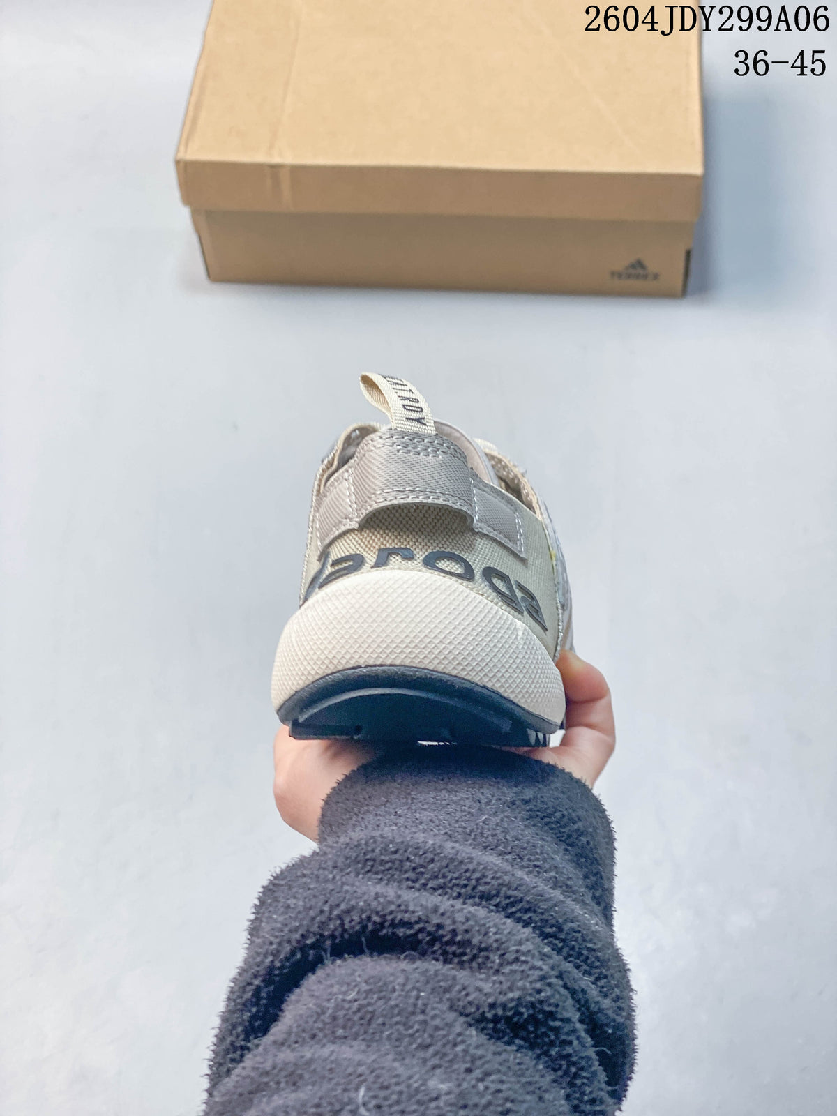 Rear view of a light beige Adidas Terrex shoe showing the heel pull tab and dark outsole; image overlay reads 36–45.