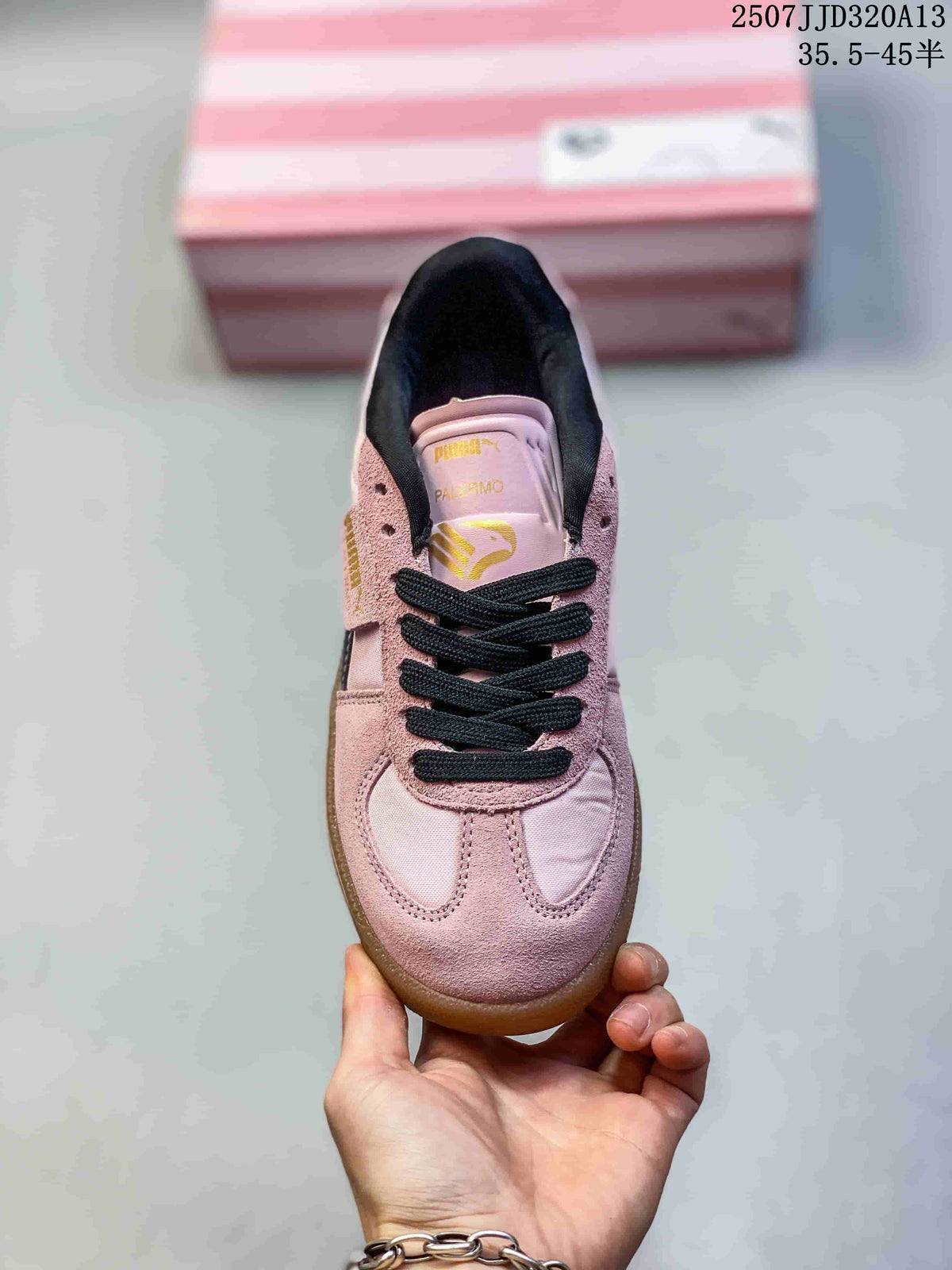 Top view of a pink Puma Palermo sneaker with black laces and contrast panels