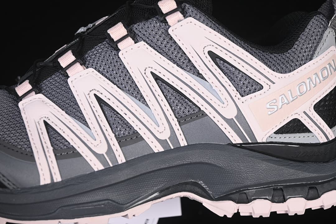Close-up of the gray mesh upper and pale accent overlays