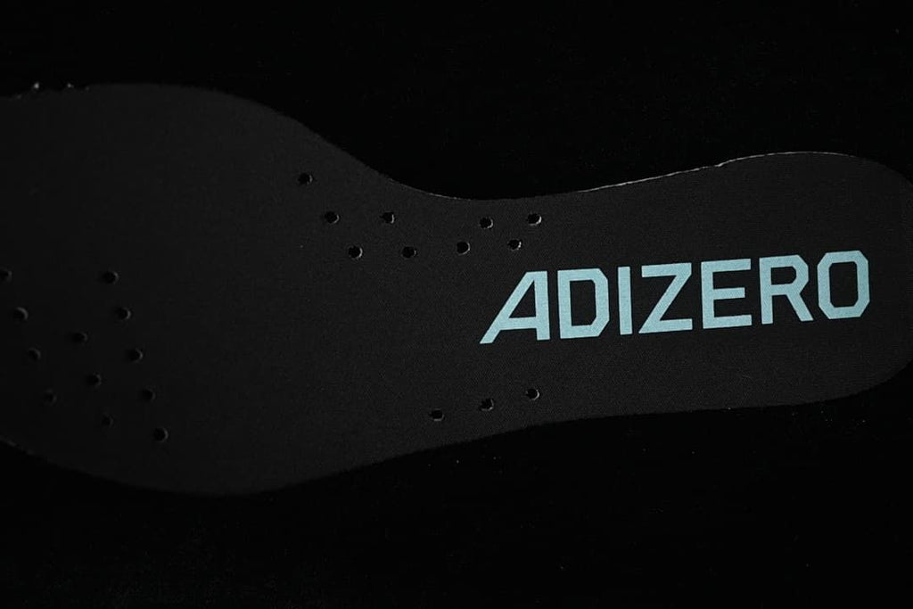 Close-up of the insole with Adizero lettering