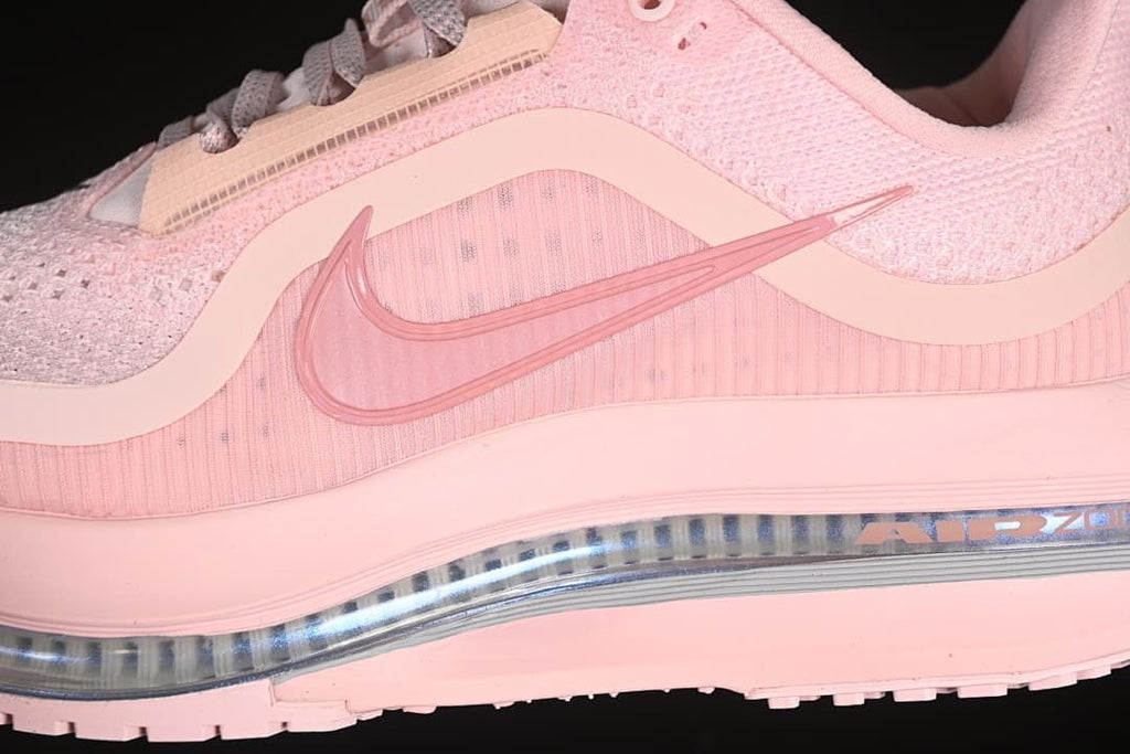 Close-up of the side swoosh, pink upper and visible Air Zoom midsole unit