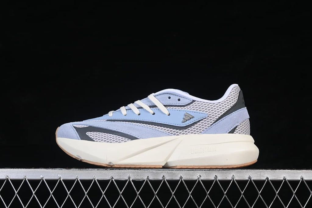 Side profile showing the adidas logo and sculpted midsole