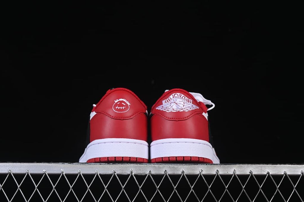 Rear view showing contrasting heel embroidery on the two shoes.