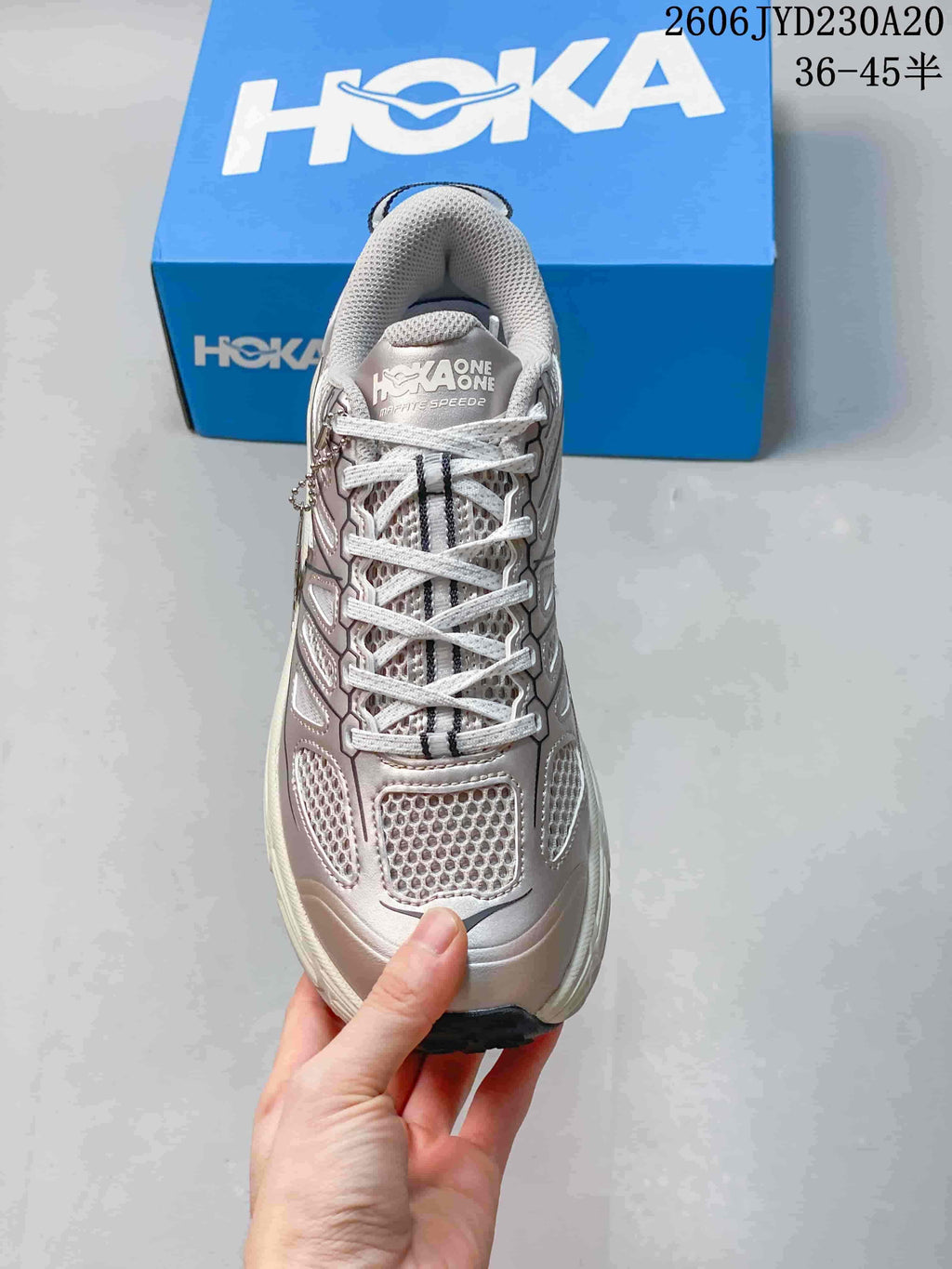 Top view of a lace-up running shoe with mesh panels