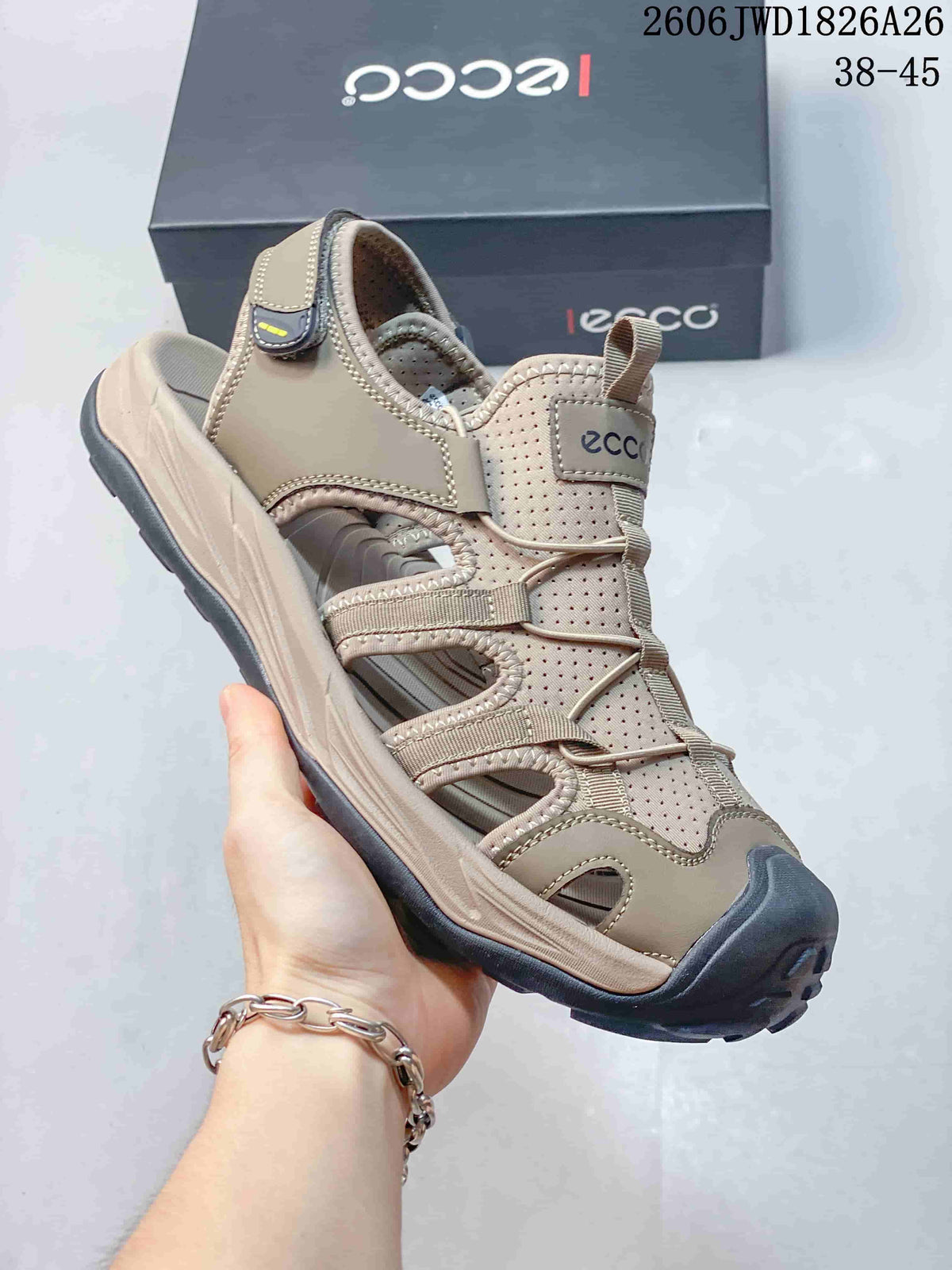 Close-up of a beige ECCO open-toe sandal showing perforated panels, side cutouts, heel strap, and cord closure.