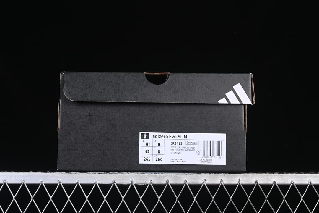 Shoe box label showing the Adizero Evo SL M name, JR3415 code, and EU 42 sample size.