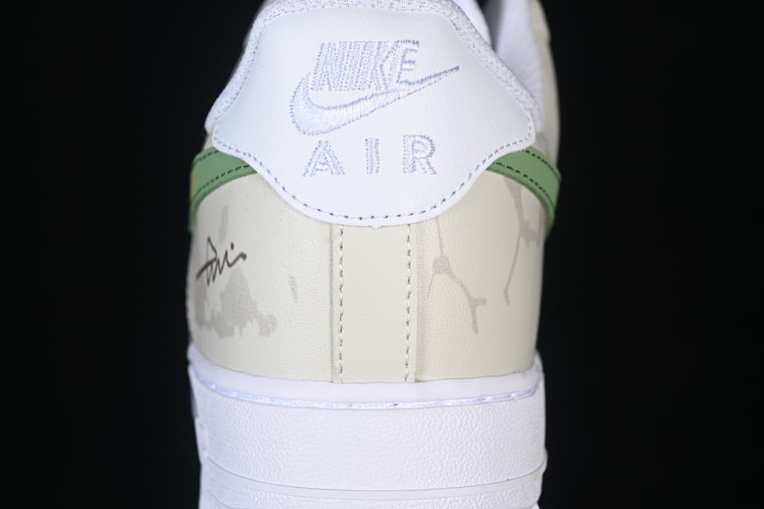 Rear view showing the heel tab and patterned cream panels
